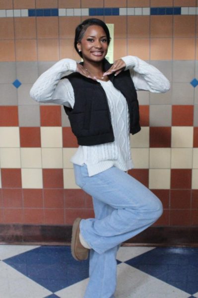 Student Mckenzie Davis poses or an outfit picture.