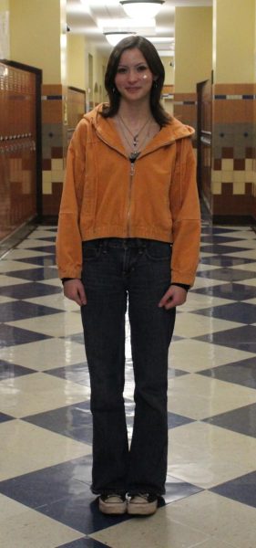 Student Lucy Brodeur poses or an outfit picture.