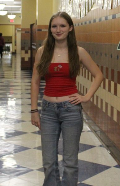Student Mya Perry poses for an outfit picture.