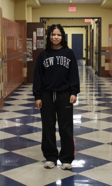 Student Emily Gutierrez-Calderon poses for an outfit picture.