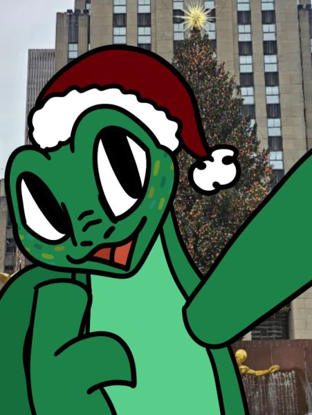 Vinny taking a selfie with a Christmas tree in the background.