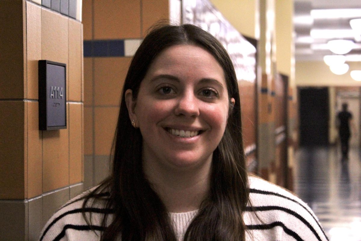 Emma Barnes smiling at the camera.