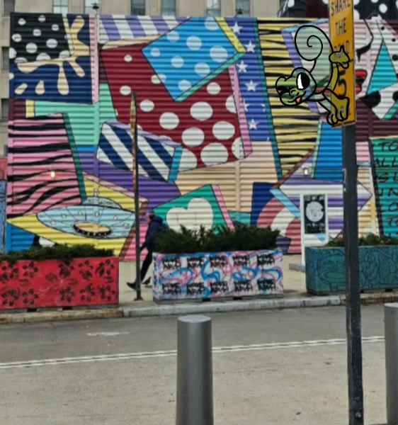 Vinny attempting to blend in with graffiti.