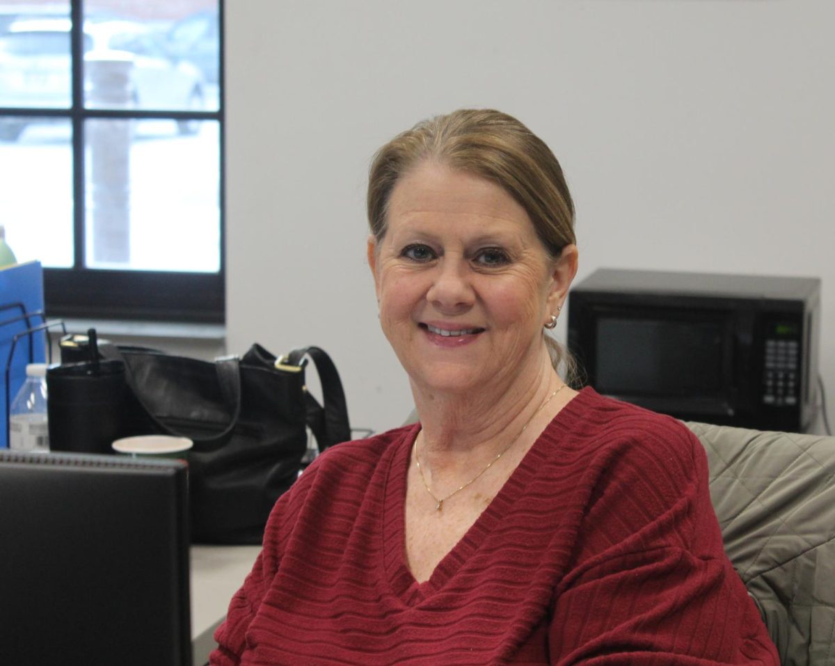 SCHS attendance secretary sits at her desk.