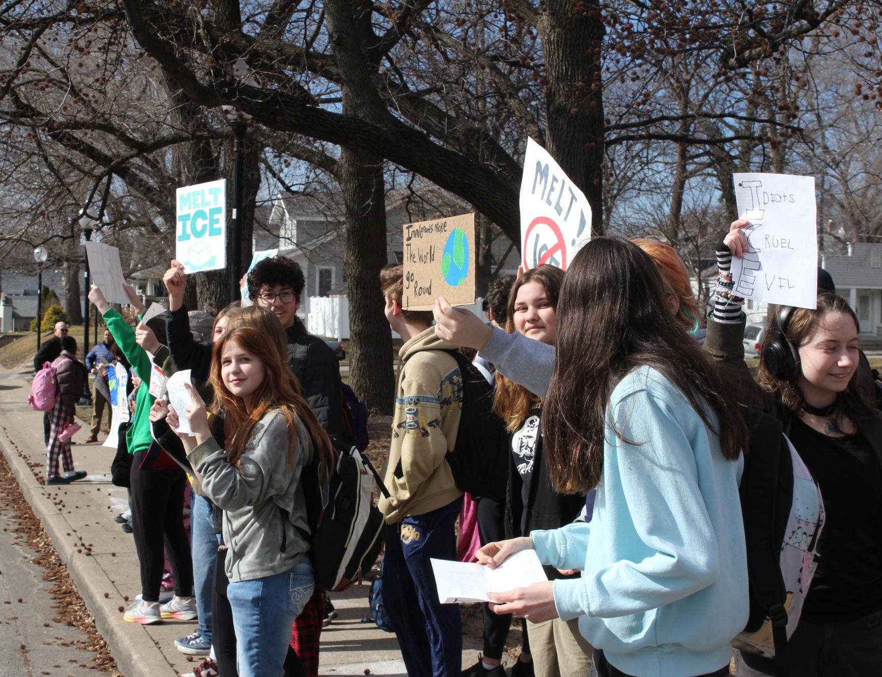 SCHS students hold protests signs outside of the school. (Lucy Brodeur)