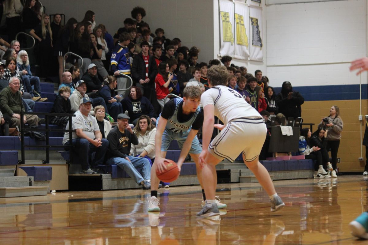 Will House faces his opponent with the ball during his game vs. Holt on Jan. 30.