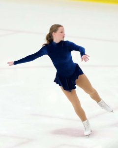Auroria Brandmeyer glides swiftly across the ice.