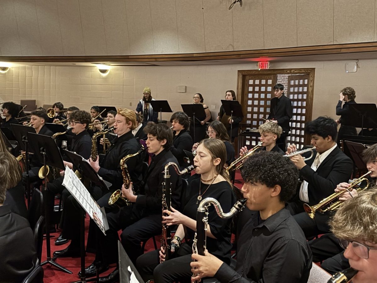 Band students warm up to perform at the festival.