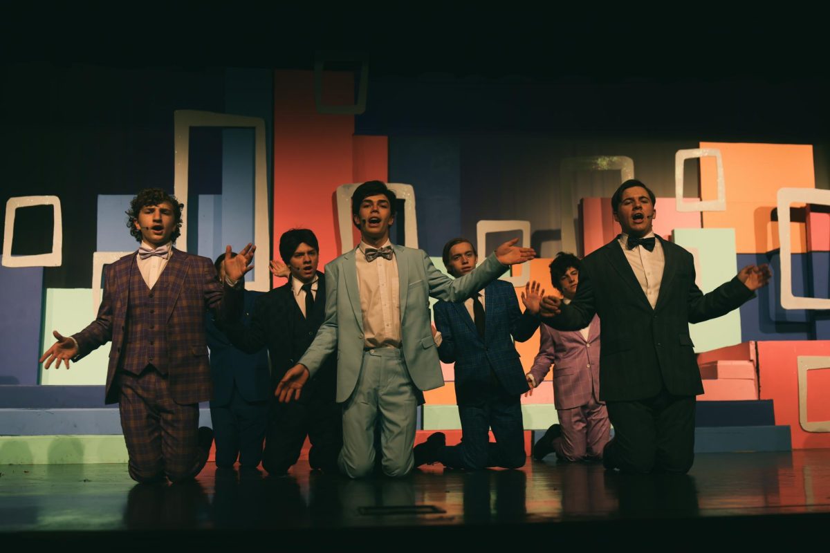 The businessmen and come together to perform.