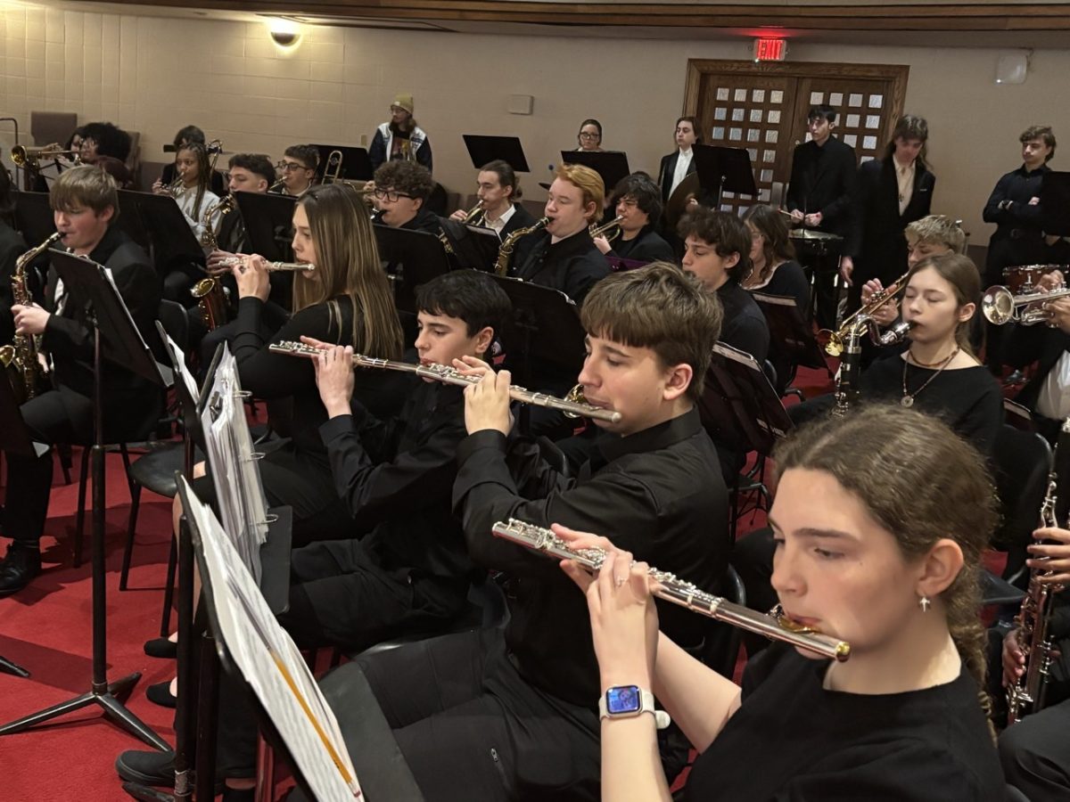 Band students warm up to perform at the festival.