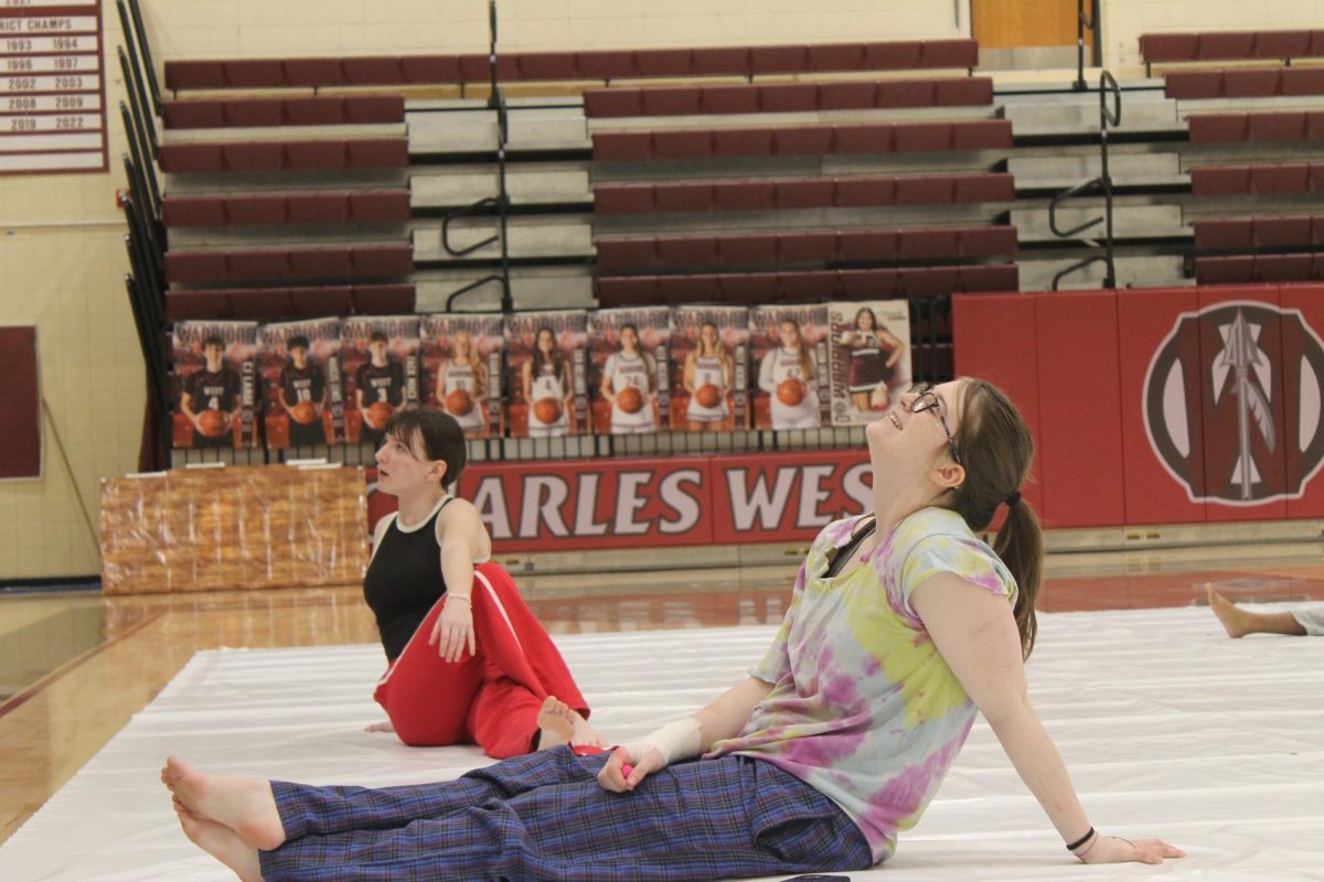 Captains Michele Kennedy and Layla Crowley stretching before practice.