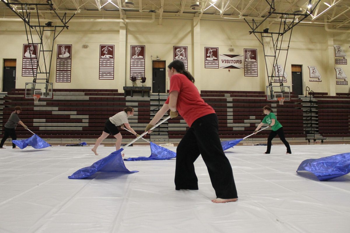 Juliana Clark, Emma Murphy, Skylar Springer, and Conner DePyper-Little doing a practice run of the show