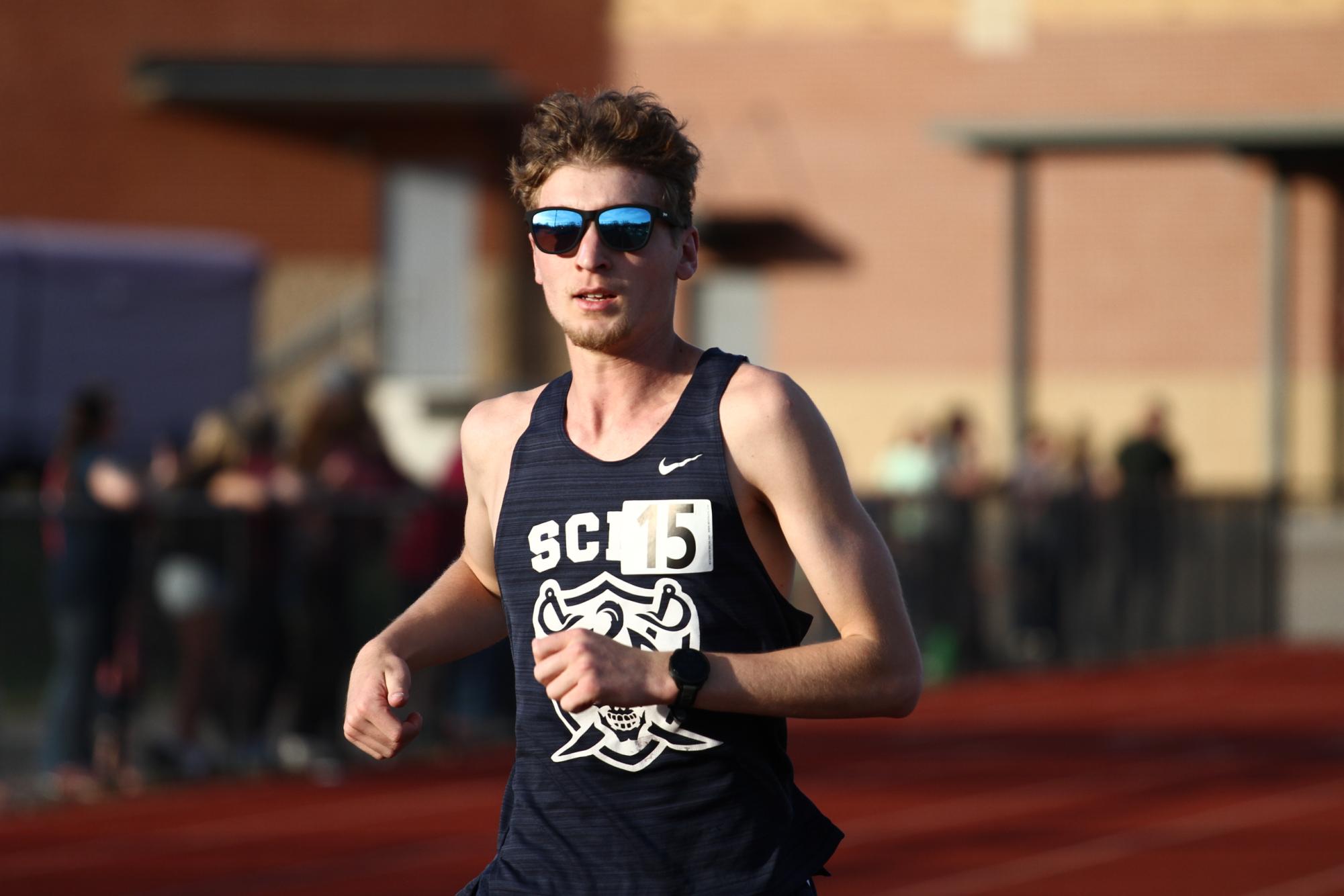Will House runs at a track meet.