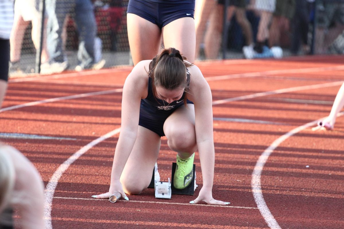 Charlotte Kulma get ready to take off at a track meet
