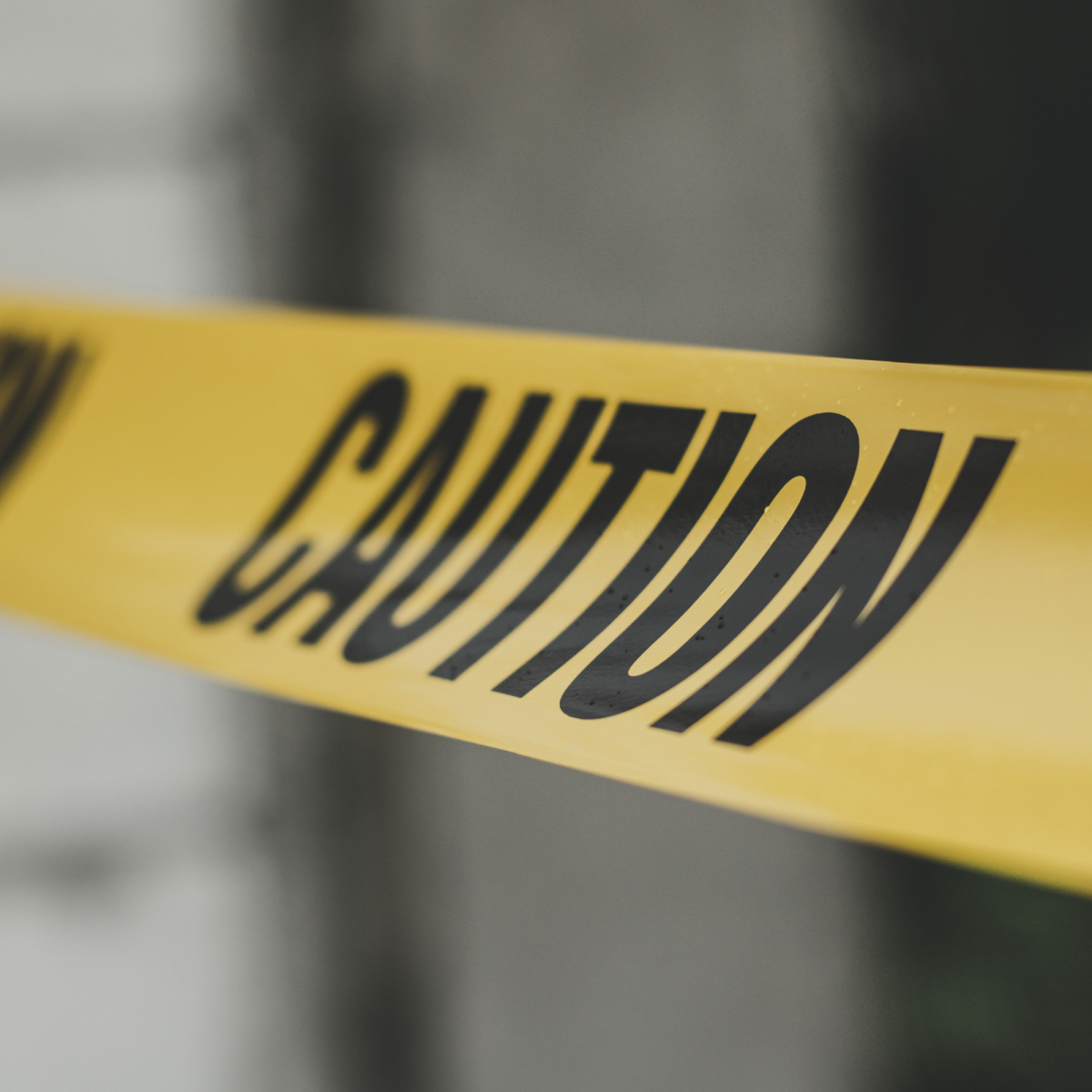 Stock image of caution tape via Canva.com