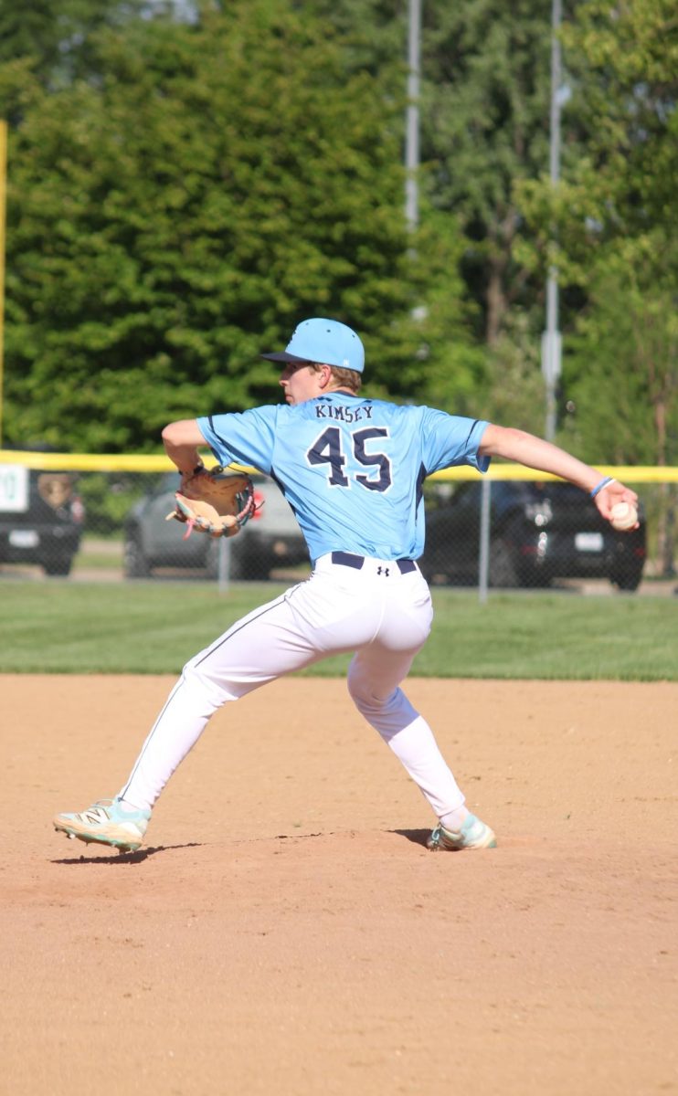 Ethan Kimsey pitches the ball.