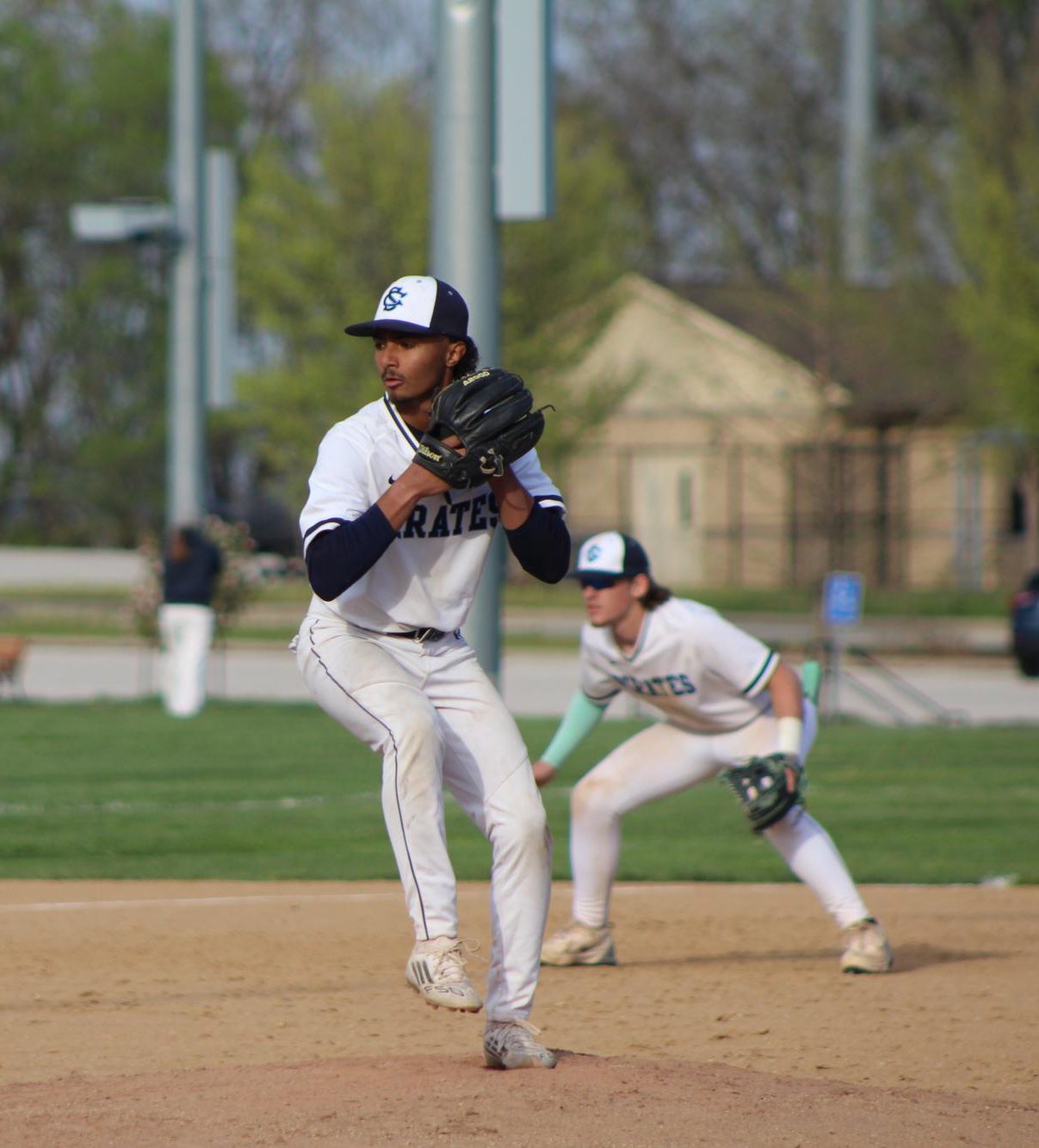 Matthew Robertson prepares to thrown down a pitch in his game against Wentzville Holt.